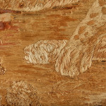 A large 19th century woolwork picture of a leopard