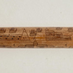 An incised bamboo cane depicting trade shipping at the Dejima Gate, Nagasaki