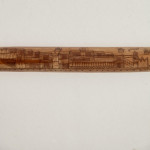 An incised bamboo cane depicting trade shipping at the Dejima Gate, Nagasaki