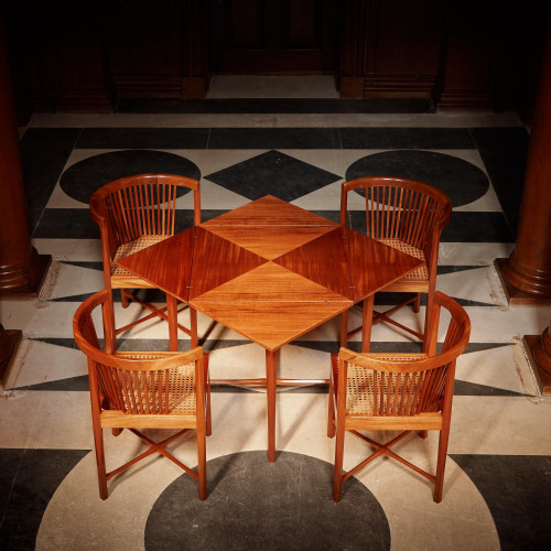 A rare mahogany "Games table for a lady" table and chairs by Kaare Klint (1888 - 1954)