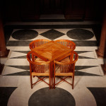 A rare mahogany "Games table for a lady" table and chairs by Kaare Klint (1888 - 1954)