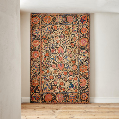 A large mounted silk Bukhara Suzani