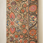 A large mounted silk Bukhara Suzani