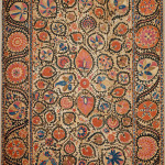 A large mounted silk Bukhara Suzani