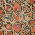 A large mounted silk Bukhara Suzani