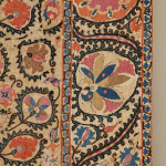A large mounted silk Bukhara Suzani