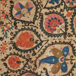 A large mounted silk Bukhara Suzani
