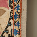 A large mounted silk Bukhara Suzani