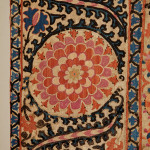 A large mounted silk Bukhara Suzani