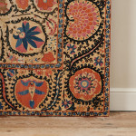 A large mounted silk Bukhara Suzani
