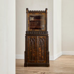 An unusual George IV Gothic revival Japanned cabinet
