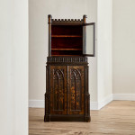 An unusual George IV Gothic revival Japanned cabinet