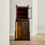 An unusual George IV Gothic revival Japanned cabinet