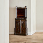 An unusual George IV Gothic revival Japanned cabinet