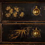 An unusual George IV Gothic revival Japanned cabinet
