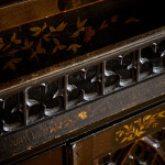 An unusual George IV Gothic revival Japanned cabinet
