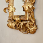 A fine and large carved and giltwood Baroque mirror in the manner of Filippo Passarini (1638 - 1698)