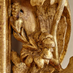 A fine and large carved and giltwood Baroque mirror in the manner of Filippo Passarini (1638 - 1698)