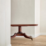 A Regency mahogany crossbanded rectangular snap top centre table