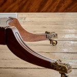 A Regency mahogany crossbanded rectangular snap top centre table