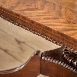 A Regency mahogany crossbanded rectangular snap top centre table