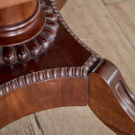 A Regency mahogany crossbanded rectangular snap top centre table