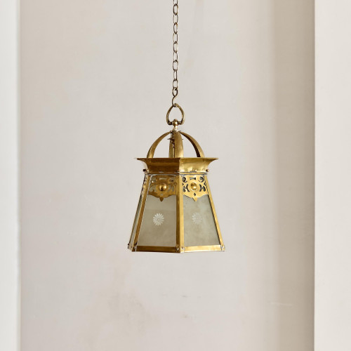 An Arts & Crafts brass hall lantern
