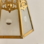 An Arts & Crafts brass hall lantern