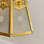 An Arts & Crafts brass hall lantern