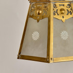 An Arts & Crafts brass hall lantern