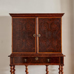 A fine William and Mary olivewood oyster veneered cabinet on stand