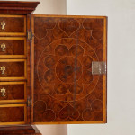 A fine William and Mary olivewood oyster veneered cabinet on stand