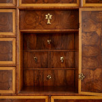 A fine William and Mary olivewood oyster veneered cabinet on stand