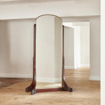 A large double sided standing mirror attributed to Maurice Dufrène (1876 - 1955)