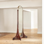 A large double sided standing mirror attributed to Maurice Dufrène (1876 - 1955)