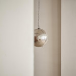 A Victorian glass witch's ball