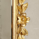 A George I carved giltwood mirror in the manner of James Moore