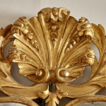 A George I carved giltwood mirror in the manner of James Moore
