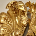 A George I carved giltwood mirror in the manner of James Moore