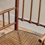 An Arts & Crafts armchair in the manner of Liberty & Co