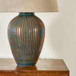 A green baluster vase by Roger Calero, converted to a lamp