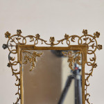 An Aesthetic movement gilt bronze easel mirror