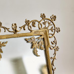 An Aesthetic movement gilt bronze easel mirror