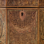 A George III scrolled paper tea caddy