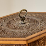 A George III scrolled paper tea caddy