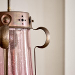 An Arts & Crafts copper lantern in the manner of WAS Benson