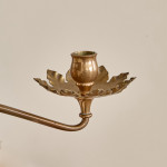 A pair of Arts & Crafts brass candlesticks after a design by W.A.S Benson