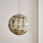 An unusual and large Victorian decalcomania witch's ball