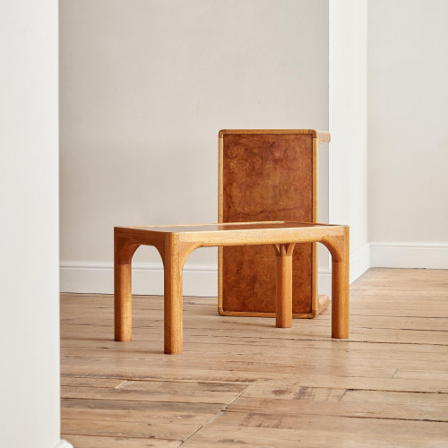 A pair of rectangular teak and leather low tables