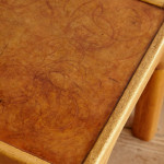 A pair of rectangular teak and leather low tables